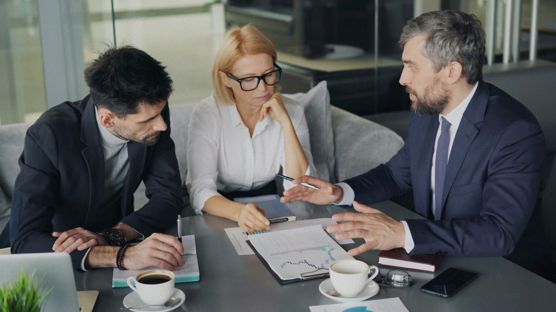 Investors reviewing portfolio data
